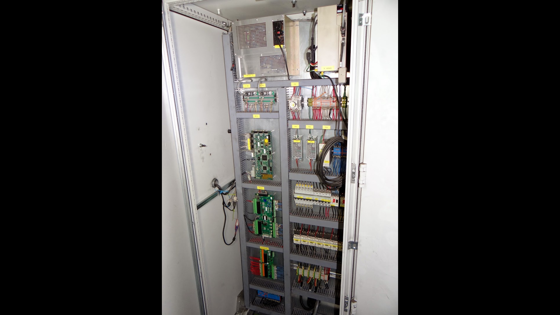 New CNC controls on the left side of the control cabinet