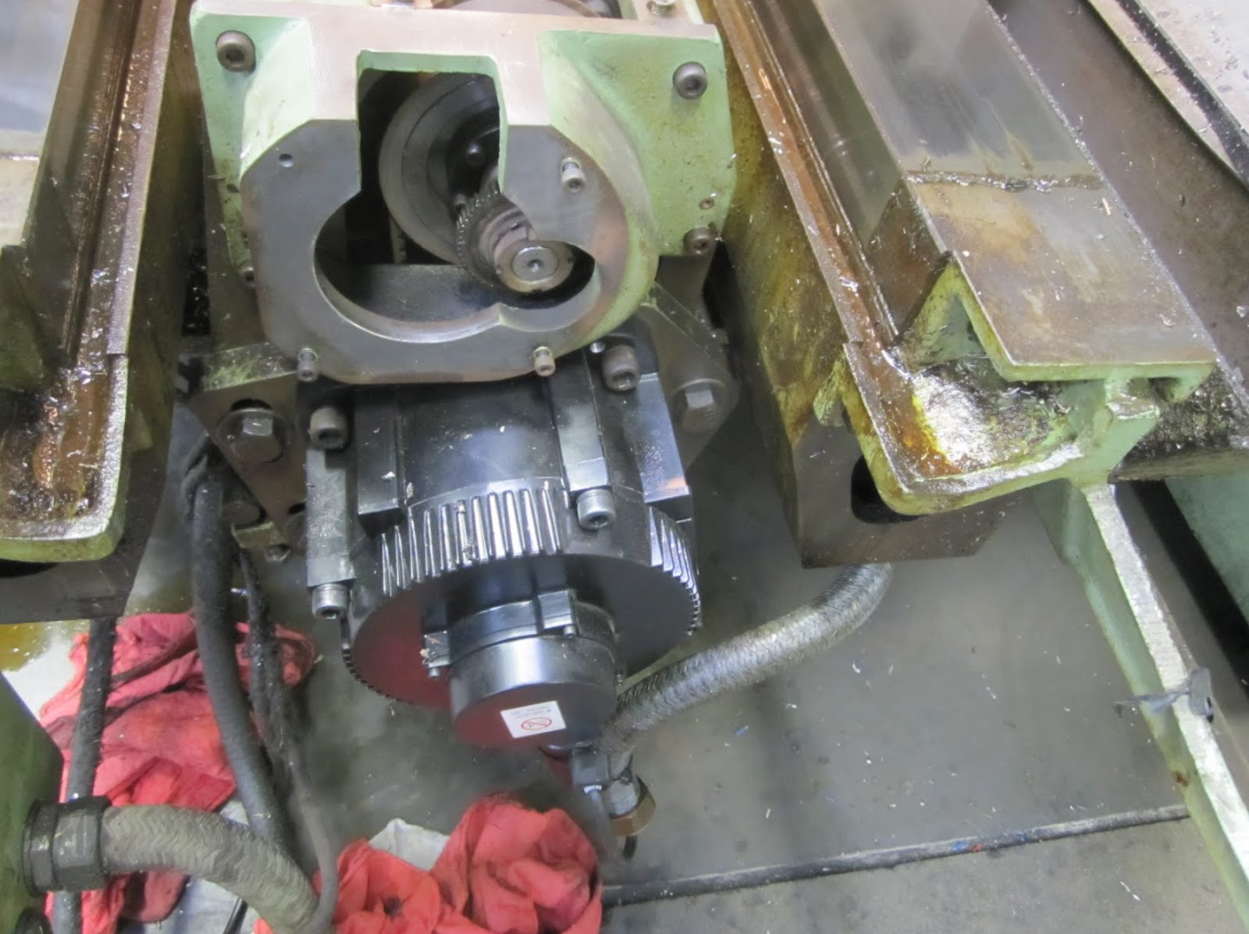 Axis motor removed showing drive gear